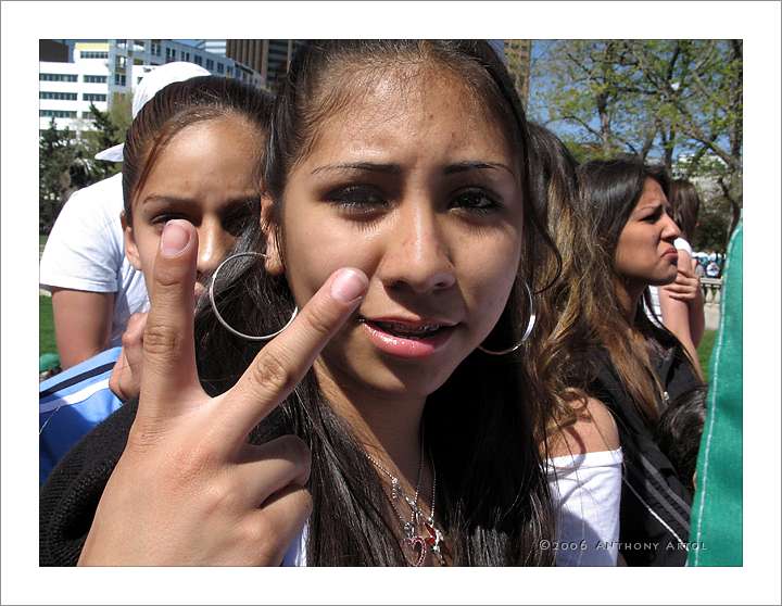 Young Woman Showing Victory Sigb